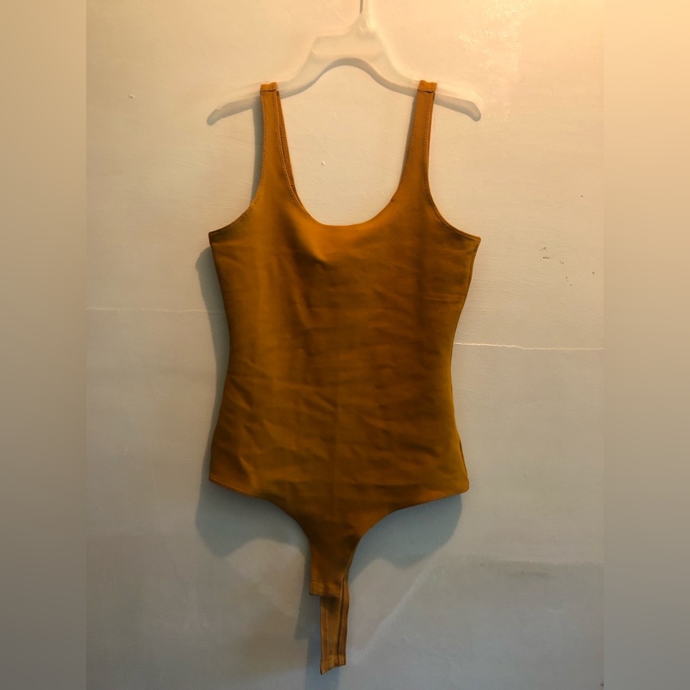 dark yellow bodysuit